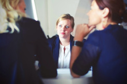 Three women in a discussion