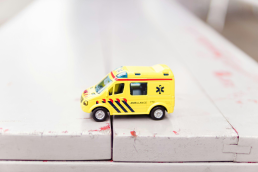 A miniature yellow ambulance
