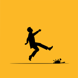 A man about to slip on the wet floor